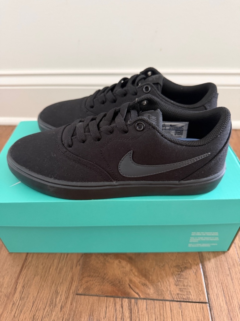 Nike SB Check Solar Canvas shoes in black and anthracite